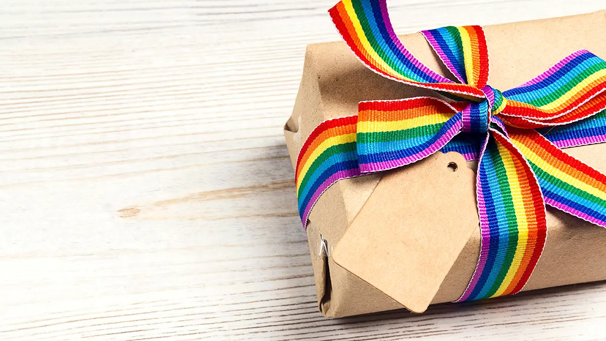 A photo of celebrate pride month with a pride gift