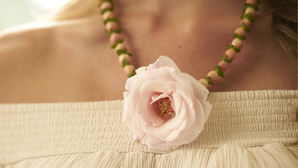 A photo of diy prom flowers: pendant flower necklace