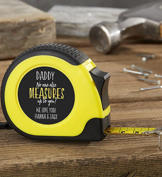 a photo of father's day gift guide with a personalized tape measure