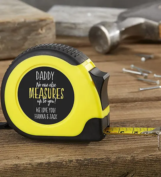a photo of father's day gift guide with a personalized tape measure