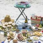 a photo of beach picnic with a beach picnic setup