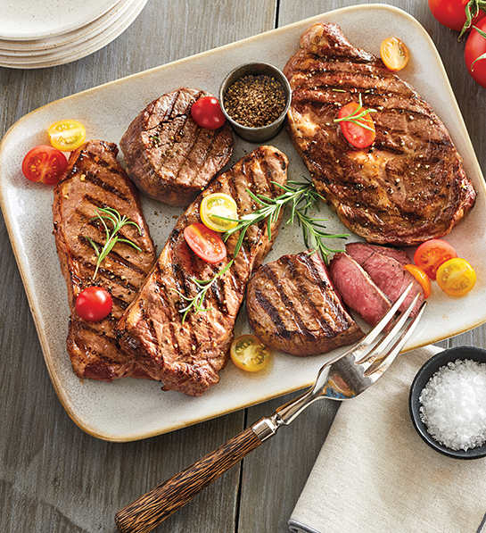 Una foto de ideas de regalos para el Día del Padre con un plato de bistec cocinado