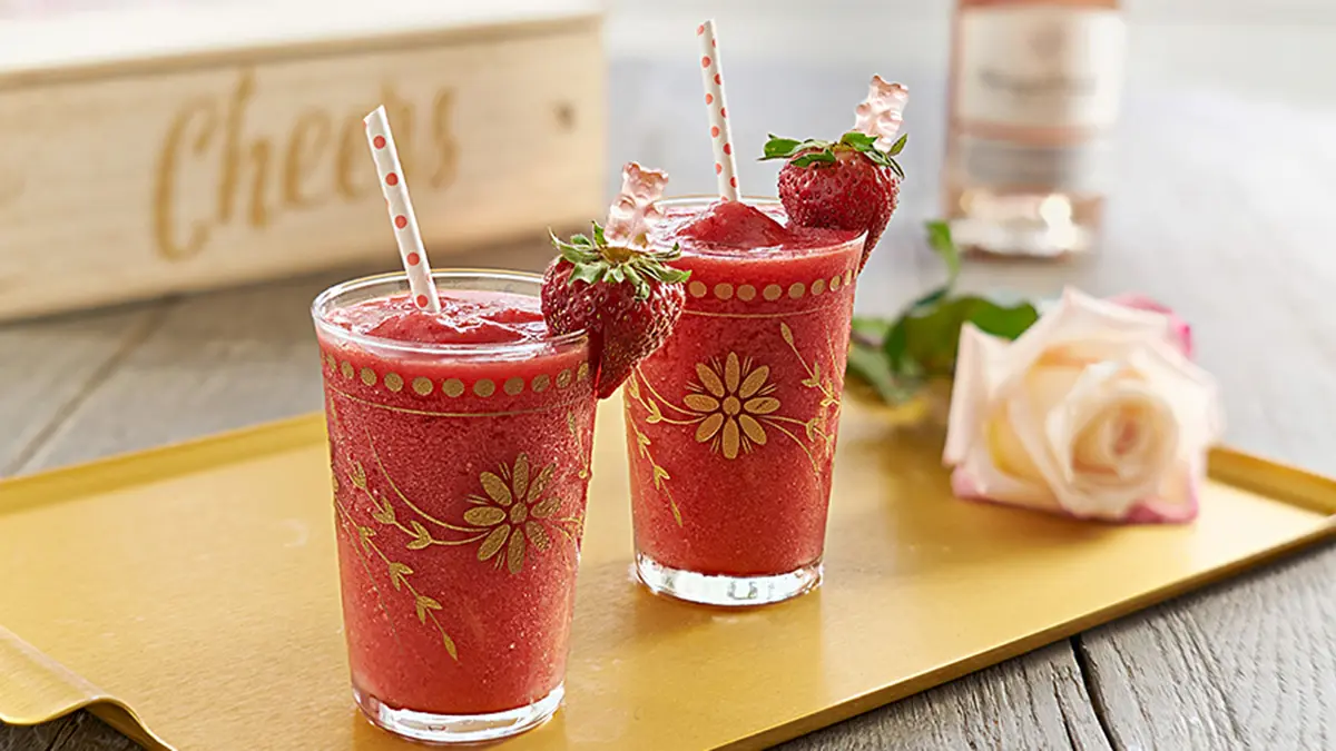 photo of waxed roses with two glasses of frosé