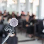 how to write a eulogy with a microphone on a funeral podium