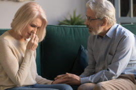 support grieving friends with man supporting grieving woman