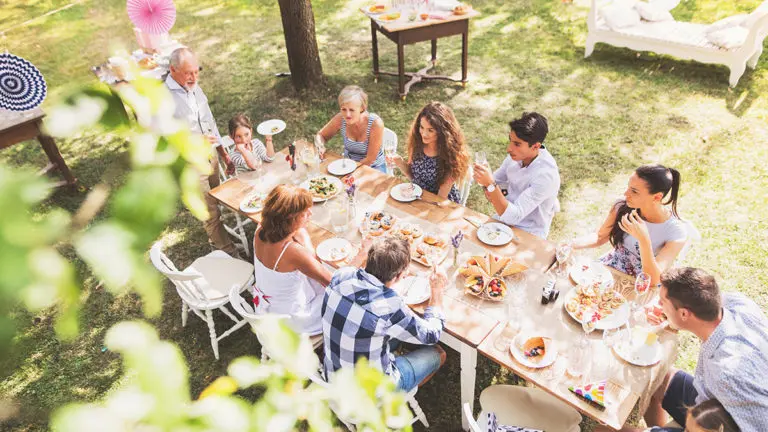 backyard party with family celebration outside in the backyard