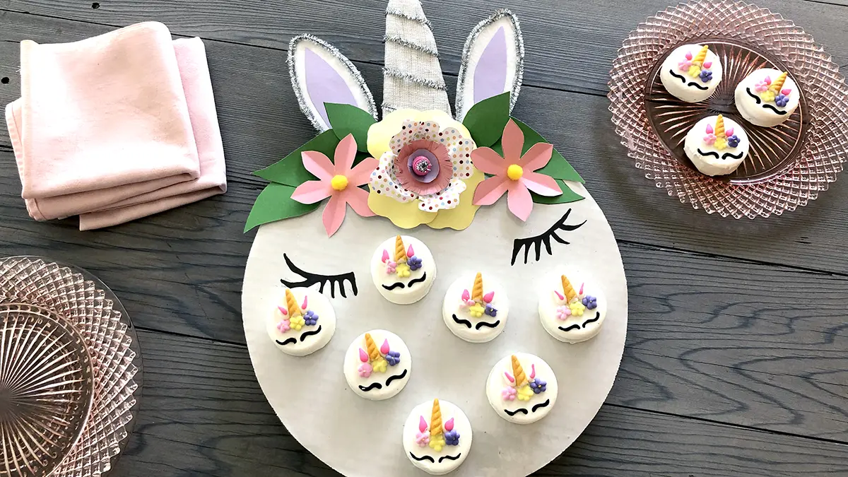 unicorn decorations with unicorn party platter with place setting