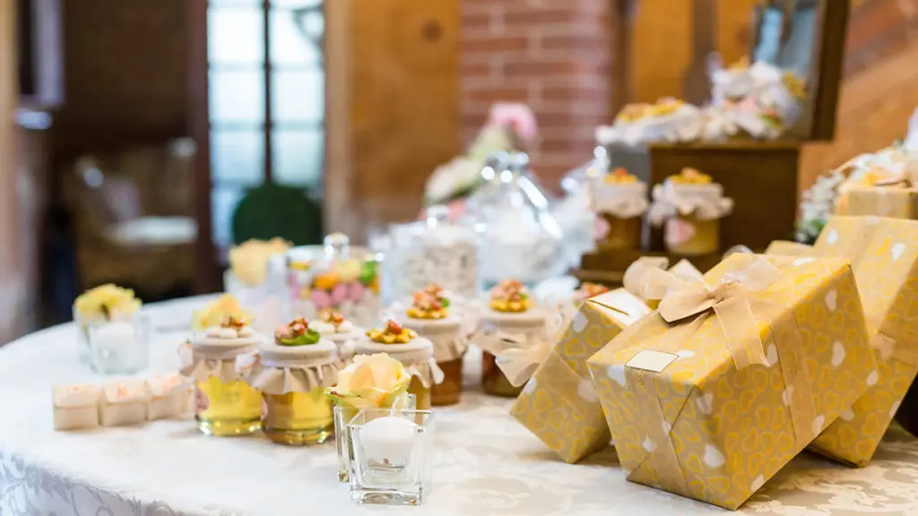 fall wedding favors with table of wedding favors on table