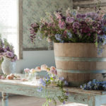 decorating for fall with fall flowers on a table