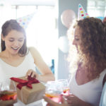 birthday gifts for scorpio woman opening present
