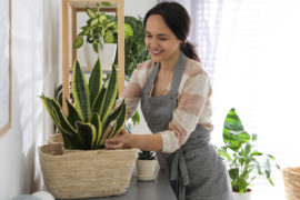 birthday gifts for sagittarius with woman caring for plant