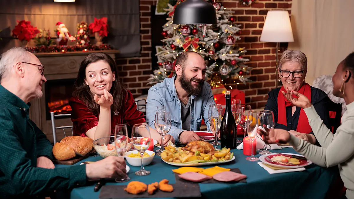 grief during the holidays with family sitting around table talking