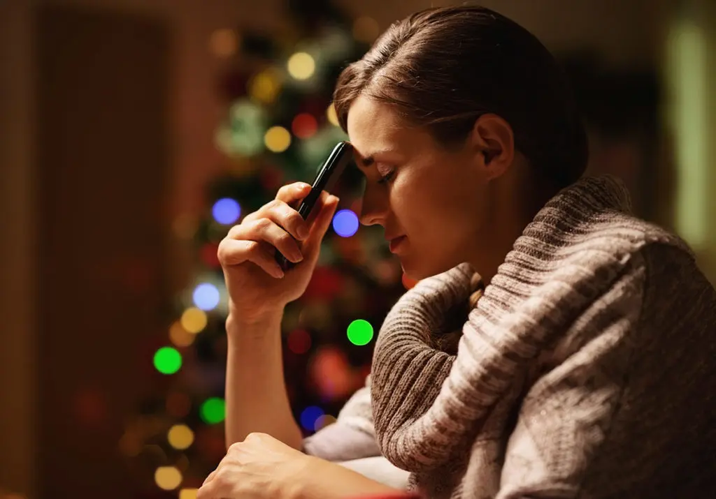grief during the holidays with woman grieving
