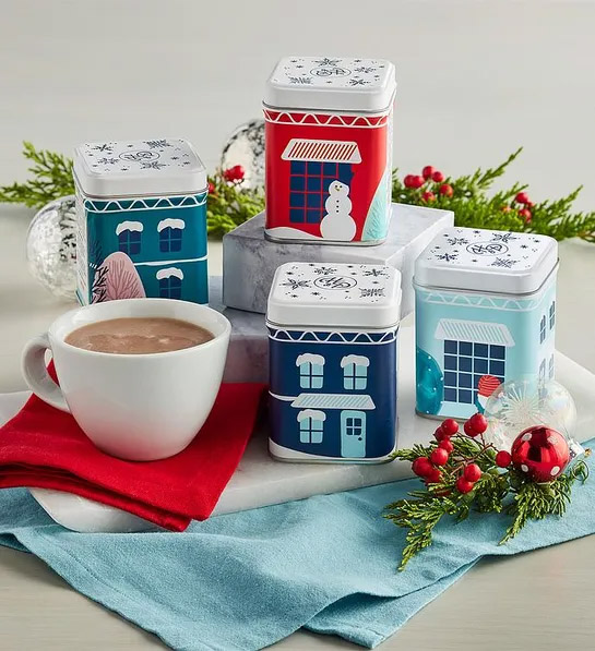 Ideas de regalo de elefante blanco con la colección navideña de latas de chocolate caliente