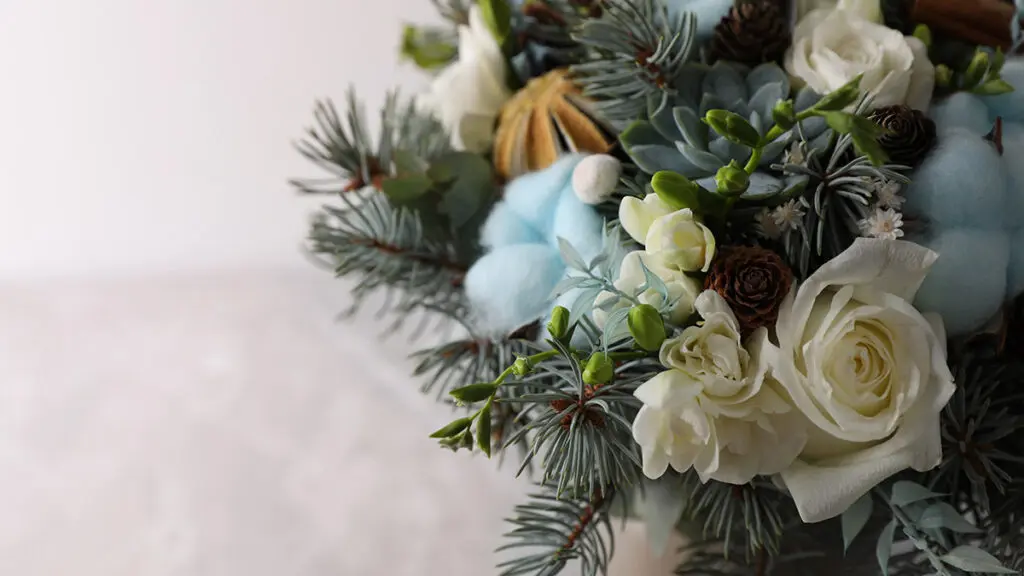 winter wedding flowers with evergreens