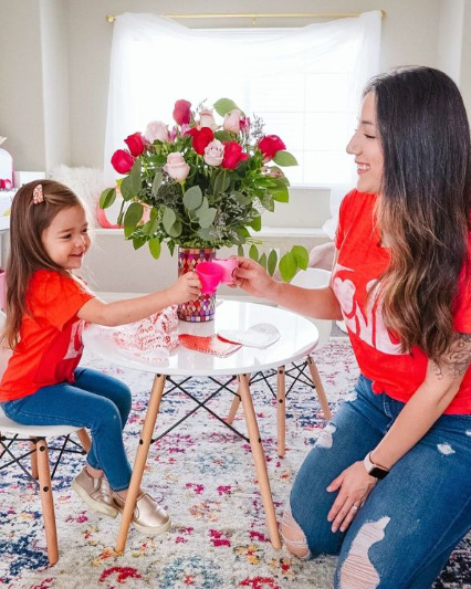 Valentines Day flowers for everyone with mother and daughter at valentines day