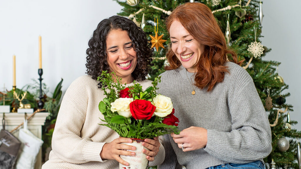 friendship benefits with friends holding flowers