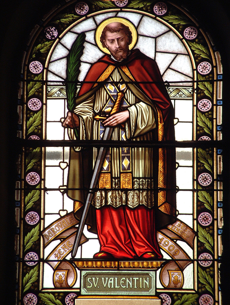 history of valentines day with stained glass window of saint valentine