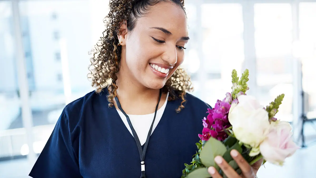 ways to honor nurses with nurse getting flowers