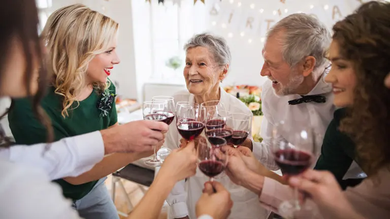 birthday party ideas for seniors with family toasting