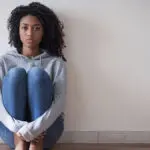 Young girl in trouble feeling sad and depressed