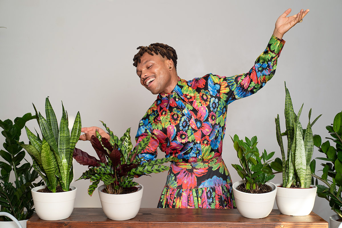 decorating with plants plant kween posing with plants