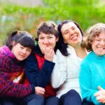 photo of people with disabilities having fun at a park