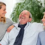 family having fun on sofa