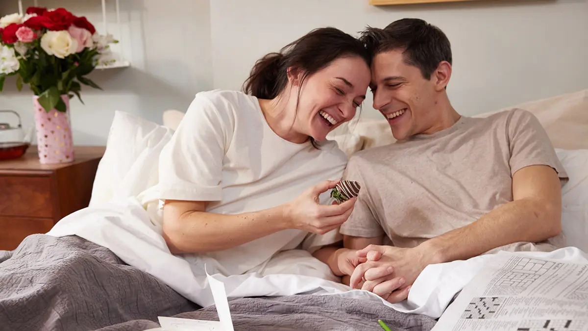 quotes about love couple laughing in bed