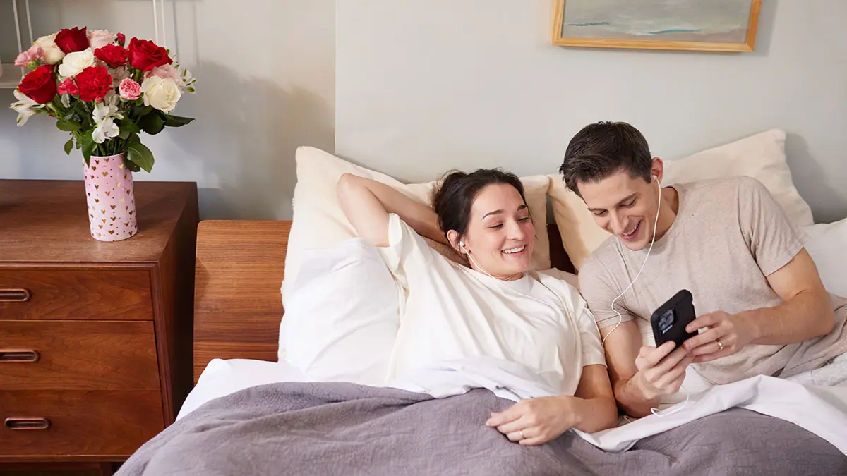 quotes about love couple lying in bed listening to music