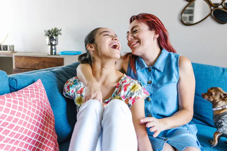 Mother and her daughter with cerebral palsy enjoying time