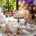 Table of desserts and sweets at the first communion party